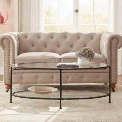 Bella 46 in. Antique Bronze/Clear Large Oval Glass Coffee Table with Shelf by Home Decorators Collection